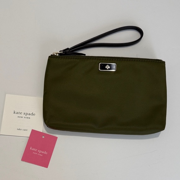 kate spade Handbags - Kate Spade medium double zip Wristlet with Black Strap